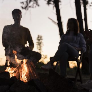 friends-at-dusk-gathering-around-fire